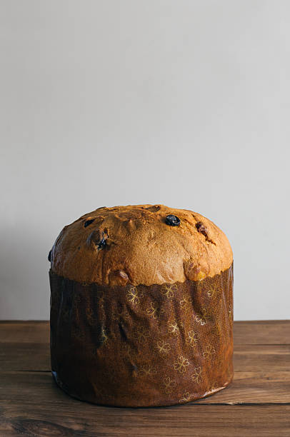 istock Christmas cake panettone on wooden background 499232378
