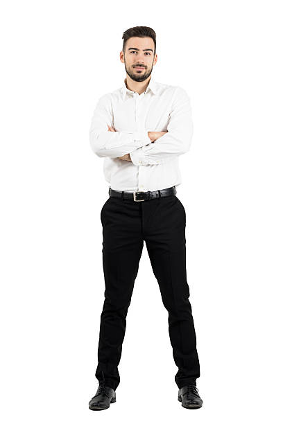 istock Young confident business man with crossed arms looking at camera 499232406