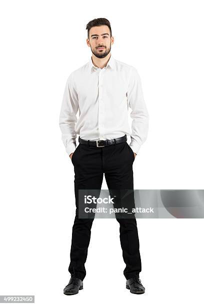 Confident Elegant Business Man With Hands In Pockets Stock Photo - Download Image Now