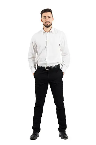 Photo of Confident elegant business man with hands in pockets