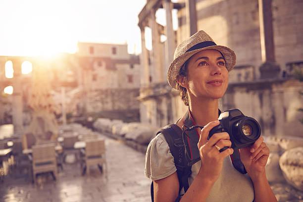 wanderlust. - vacations photographing brown hair 30s стоковые фото и изображения