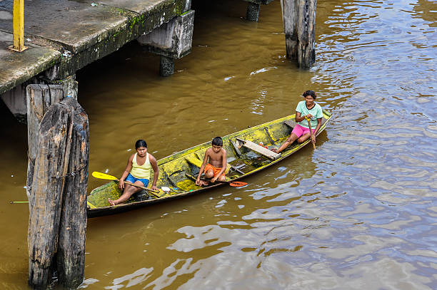 Local family on the Amazon River, Brazil stock photo
