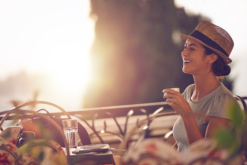 Shot of a woman enjoying a cup of coffee at a cafehttp://195.154.178.81/DATA/i_collage/pu/shoots/805976.jpg