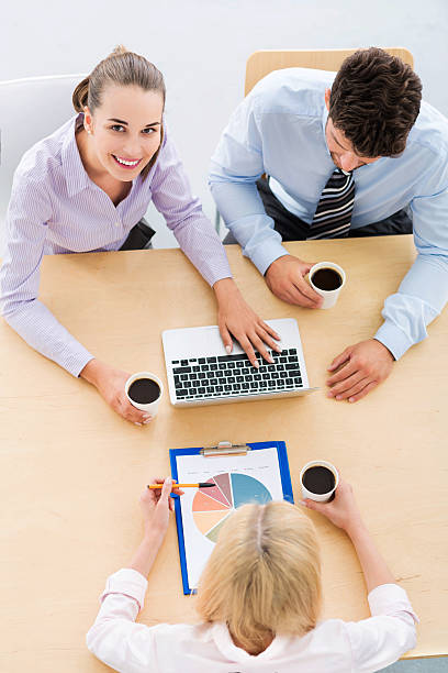 istock High angle portrait of business people at table 499237494