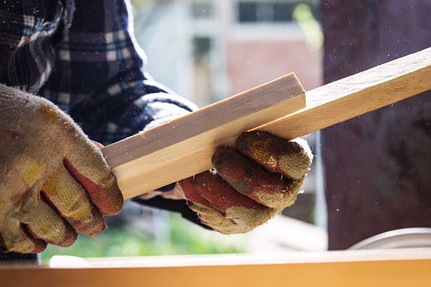 istock Carpenter working with wood, close up photo 499237992