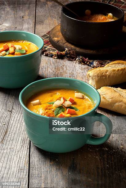 Fresh Sqaush Soup On A Rustic Table Stock Photo - Download Image Now - Meal, Multi Colored, Soup