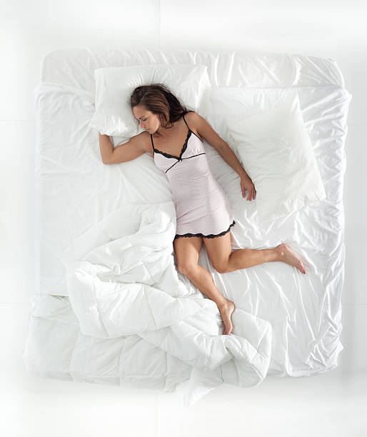 istock Above view of woman sleeping 499242067