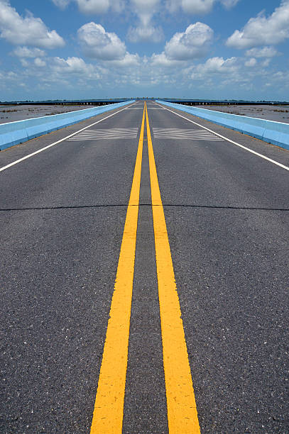 istock Empty road and the yellow traffic lines. 499242697