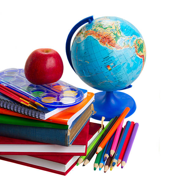 istock books with school supply and globe 499245571