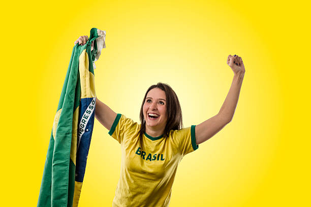 istock Female Brazilian fan celebrating 499245883