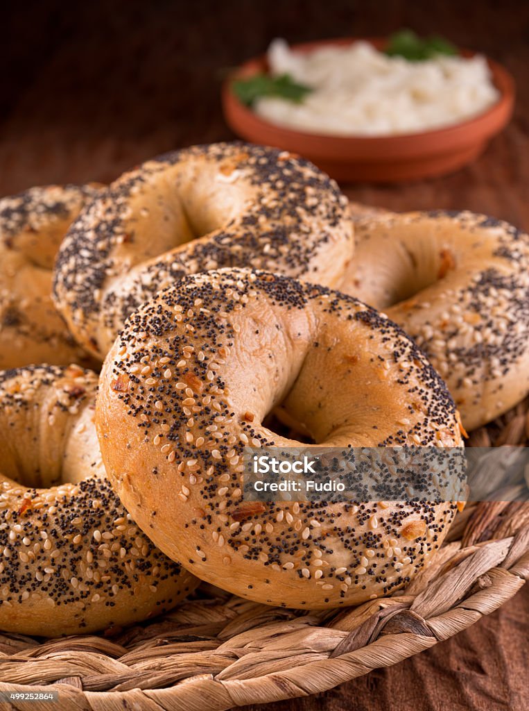 Bagels Freshly baked homemade bagels with onion, sesame seed, poppy seed, and cream cheese. Bagel Stock Photo