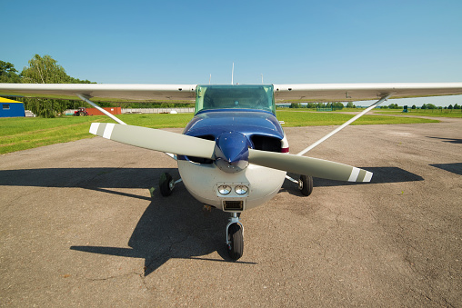 Small propeller light plane on a private airfield