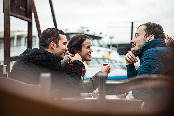 istock Happy friends drinking tea in a cafe 499255892