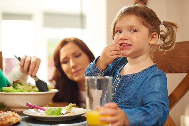 istock young family mealtime 499257088
