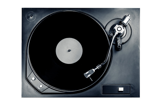 Black vinyl record isolated on a white background. Spinning musical record.