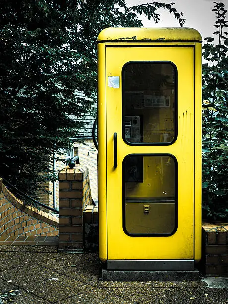 Old yellow phone cell