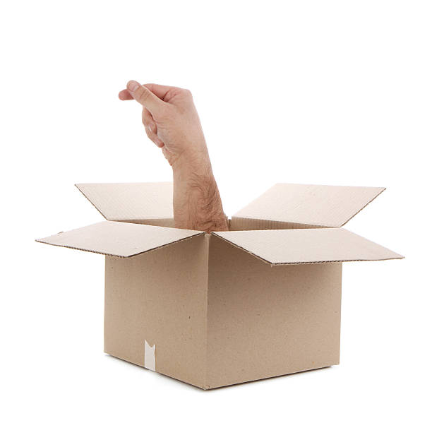 istock Hand Holding Something Coming out of Box 499259101