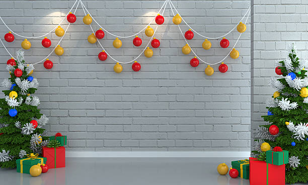 istock Christmas tree and gifts on brick white wall background. 499259506