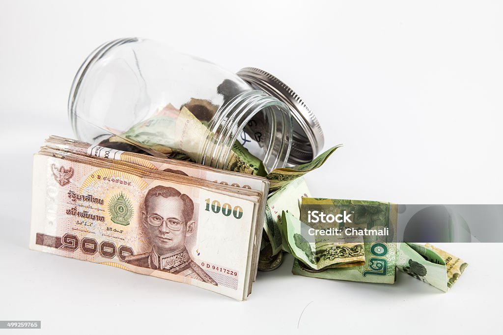 Frasco de dinero con aislar fondo blanco - Foto de stock de Accesorio financiero libre de derechos
