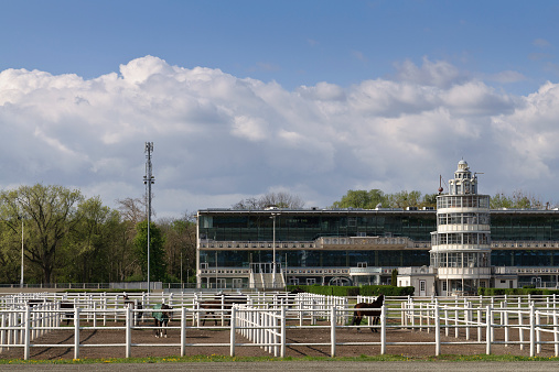 Vienna, Austria - April 9, 2014: Krieau Race Track, a horse racing track in Vienna, Leopoldstadt district. Opened in 1878, it is the second oldest harness racing track in Europe. The tower for officials, a historical landmark, was built in 1913. The Krieau harness racing club celebrates its 140 anniversary in 2014.