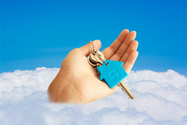 istock Concept image of key on sky 499260322