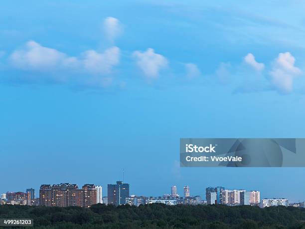 Little White Clouds In Blue Dusk Sky Over City Stock Photo - Download Image Now - Apartment, Architecture, Blue