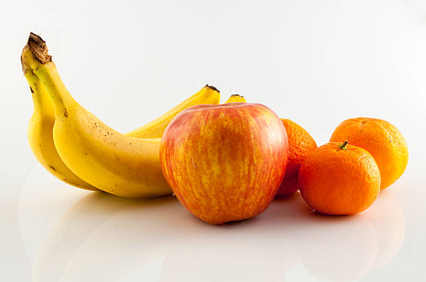 istock Banana, apple and tangerine 499261240