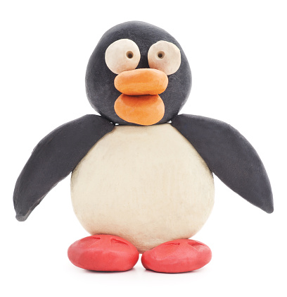 Plasticine penguin isolated on a white background.