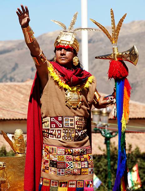 Man dressed as Inti Raymi king salutes the crowd Cusco, Peru - June 24, 2014: Man dressed as Inti Raymi king is carried high as he salutes the crowd during the parade to celebrate Inti Raymi, in the plaza de armas, cusco ,peru inti raymi stock pictures, royalty-free photos & images