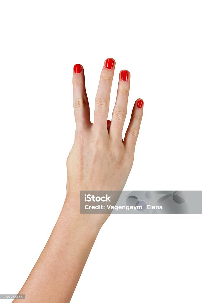 Hand closeup Female hand with manicure shows four fingers shot closeup Achievement Stock Photo