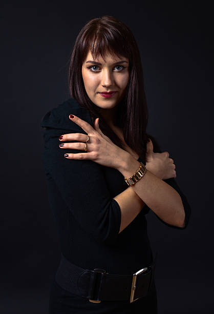 istock young beautiful woman in black 499263866