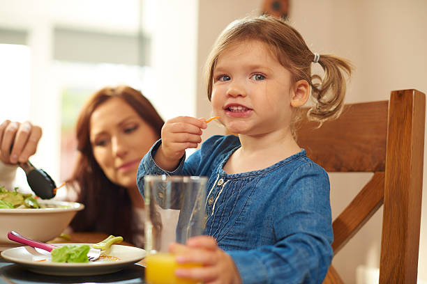 istock young family mealtime 499265050