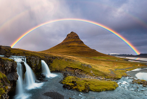 Kirkjufell Mountain and Kirkjufellsfoss Waterfalls, rainbow, autumn colors,  West Iceland