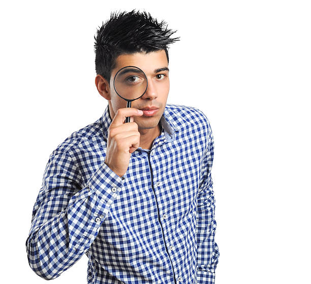 istock Man With Magnifying Glass Isolated On White Background Concept 499267428