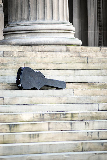 Abandoned guitar case outside St. George's Hall in Liverpool