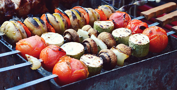 istock Grilled vegetables - tomatoes, mushrooms, onions and squash 499276373