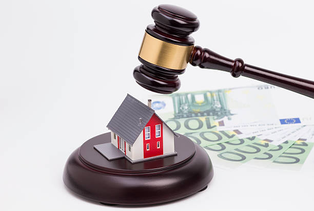 istock Wooden gavel with house 499278189