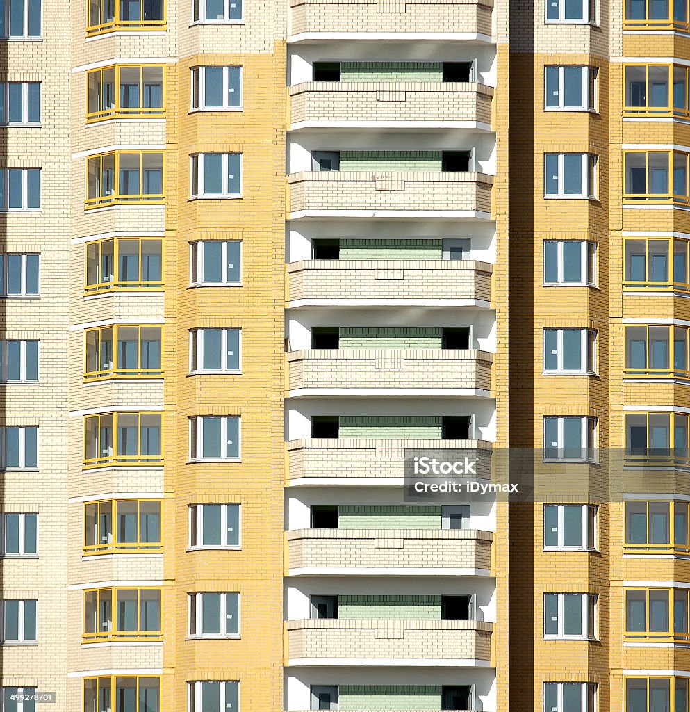 New modern residential building is ready for living Front view of new modern residential brick building closeup  Apartment Stock Photo