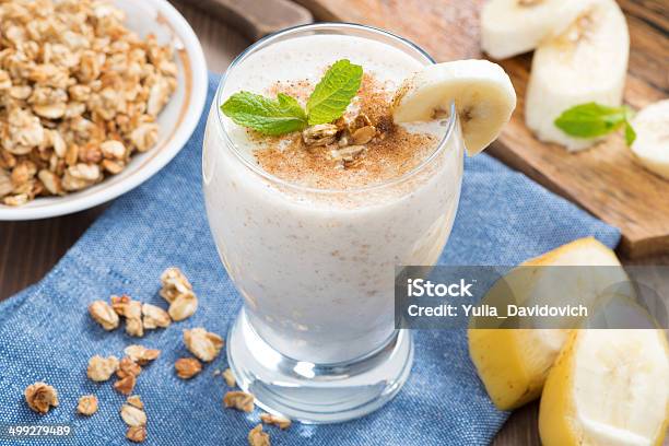 Milkshake With Banana Granola And Cinnamon In Glass Top View Stock Photo - Download Image Now