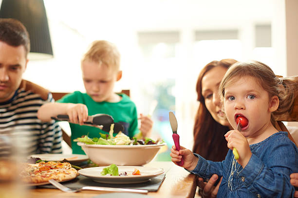 istock young family mealtime 499280332