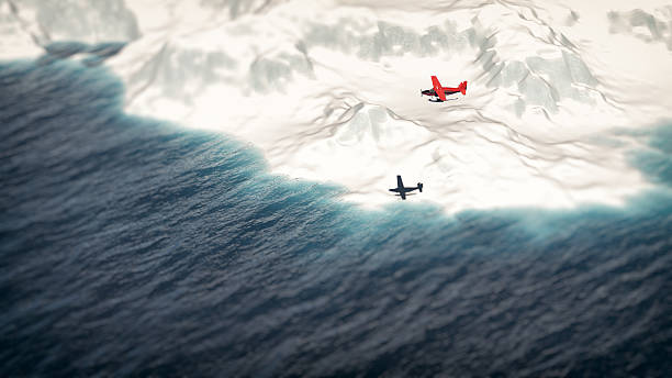 Red airplane flying over iceberg. Aerial shot.