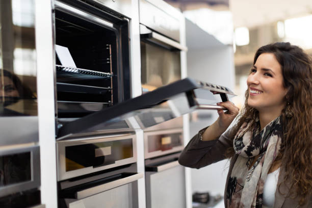 istock Woman choosing new stove 499282778