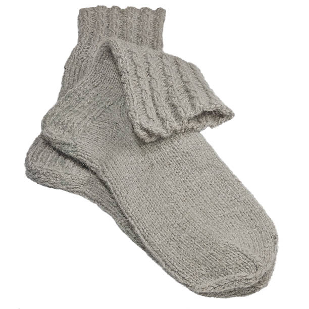 istock Warm grey knitted woolen socks, large detailed isolated macro closeup 499287726