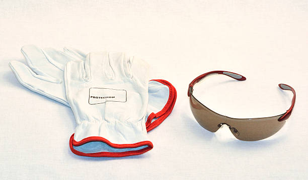Safety first 1,a pair of work gloves and safety glasses (safety equiptment)