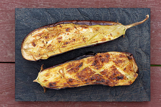 istock Grilled eggplant on wooden board 499290370