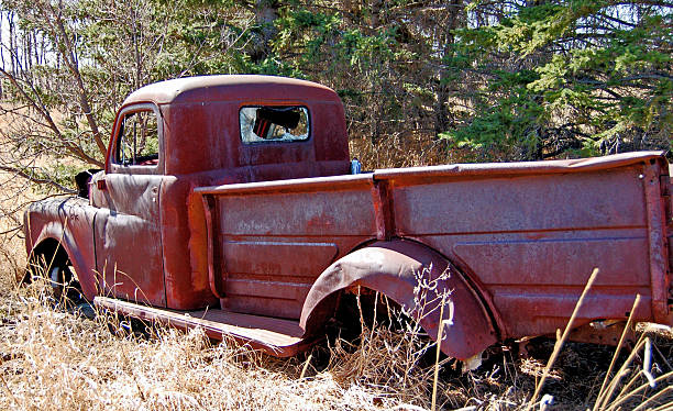 istock Abandoned red and  rusty 1950
