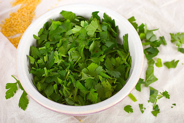Green Coriander Leaves and Chopper on a Wooden Cutting Board Stock Image -  Image of bunch, chopping: 172190589