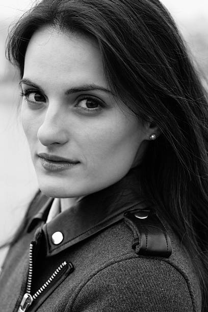 istock Beautiful woman looking at camera 499293120