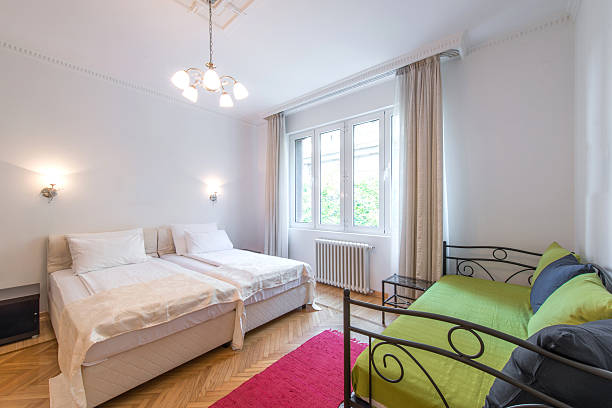 istock Interior of comfortable hostel room 499293124
