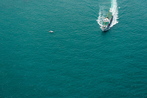 Passenger Ship and small boat in the Bosphorus, Istanbul